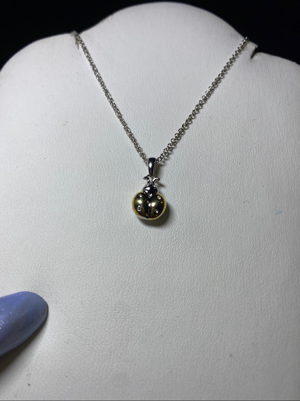 .925 ladybug rhodium with gold plating, and four natural diamonds lucky